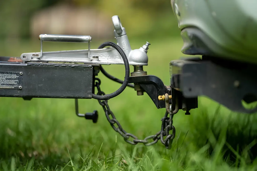 Close up of a trailer hooked up to a car