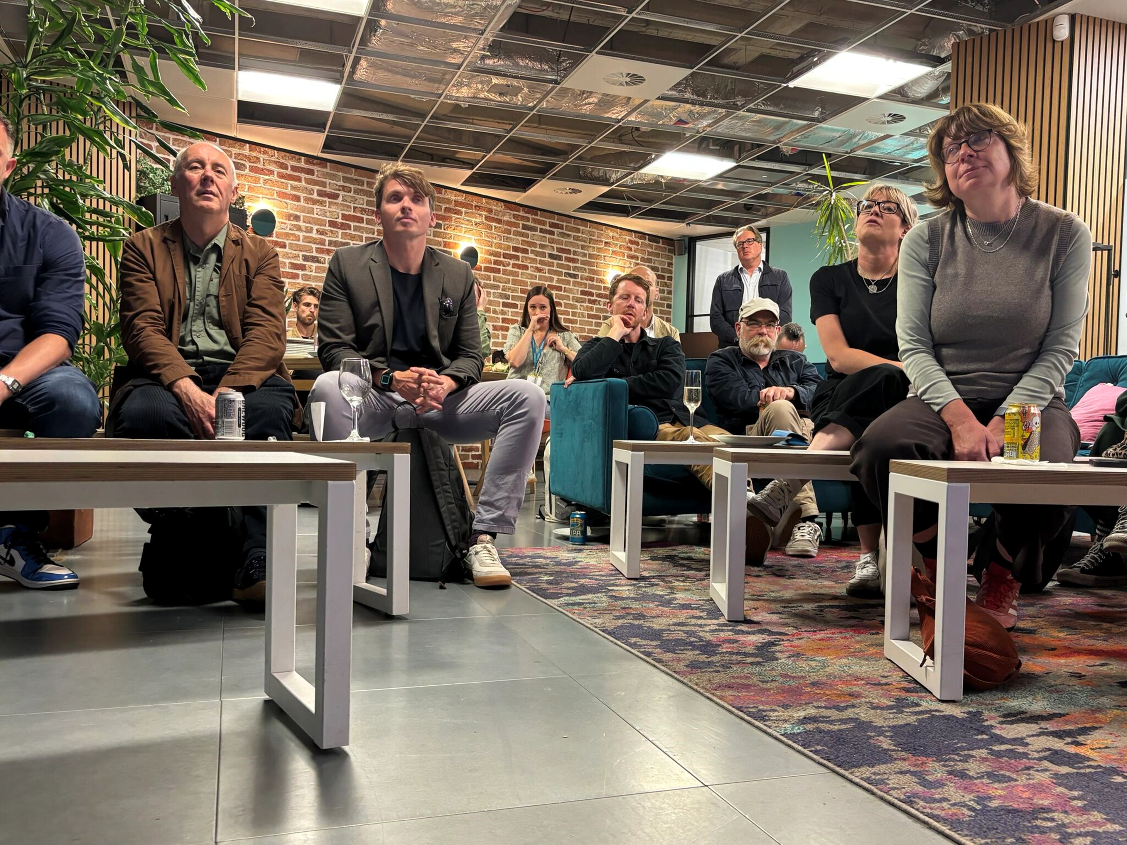 A mobile phone with Bristol Airport website displayed, sat on top of a bag
