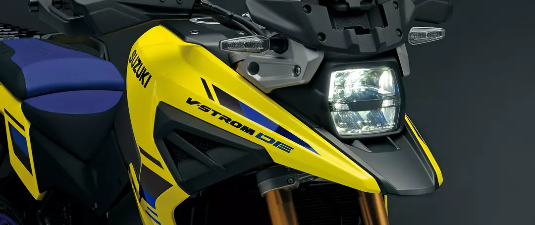 Suzuki V-Strom 1050DE front headlight and beak close up