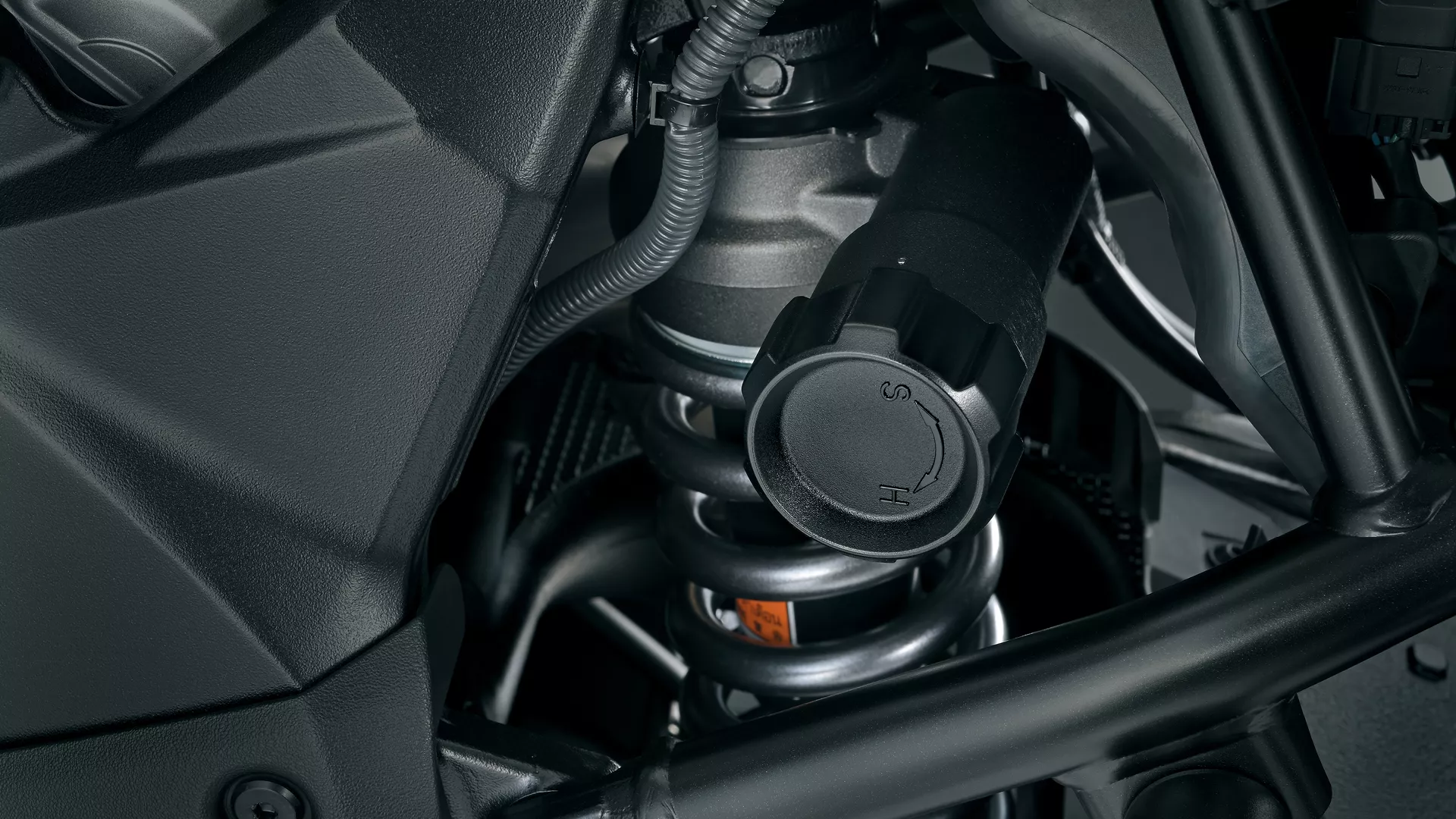 Suzuki V-Strom 1050RE detail of the rear shock and suspension