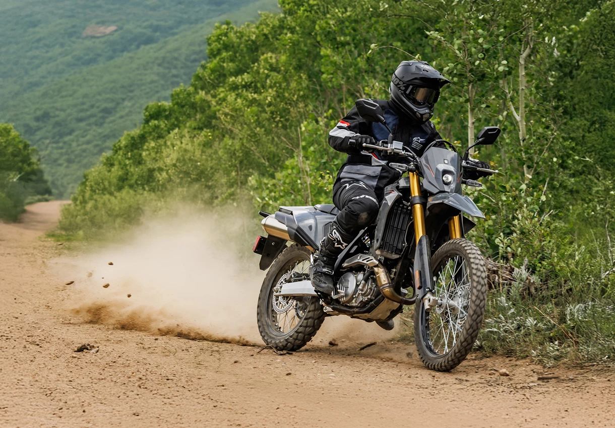 Suzuki DR-Z4S pushing on heading along a dirt track.
