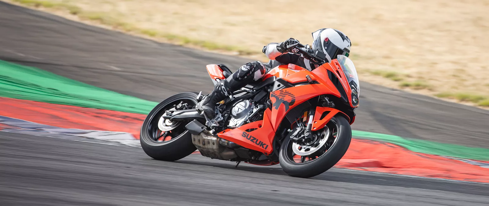 Suzuki GSX-8R leaning into a corner on track