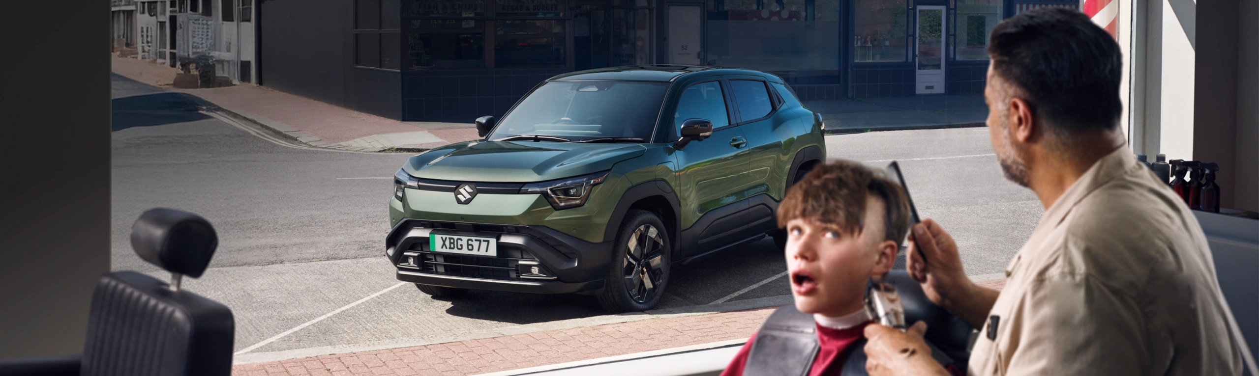 Hero banner of the Suzuki e Vitara highlighting its sculpted front design, LED lighting and alloy wheels