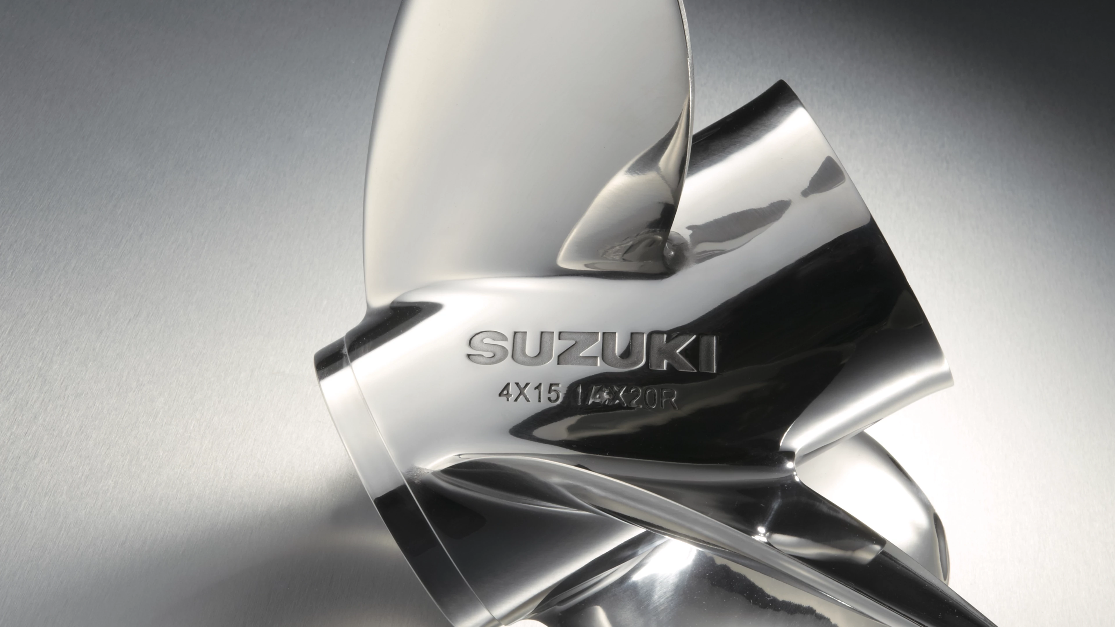 A suzuki propeller used on an outboard.