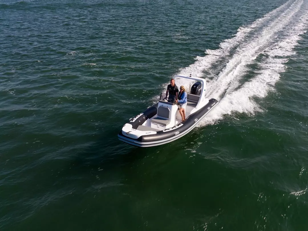 Neptune RIBs 580 at sea powered by a Suzuki outboard, as seen from the air