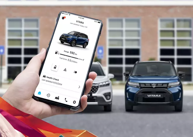 Suzuki Vitara Connect App on phone screen, controlling a parked Suzuki Vitara.