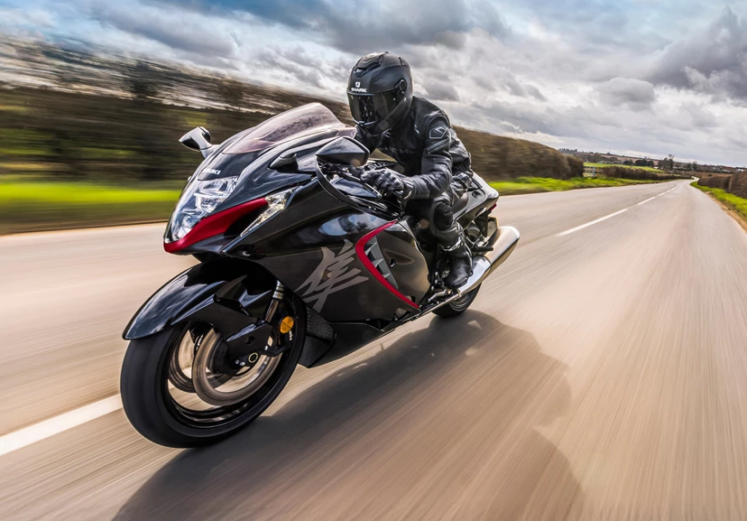 Suzuki Hayabusa riding down a country road head on