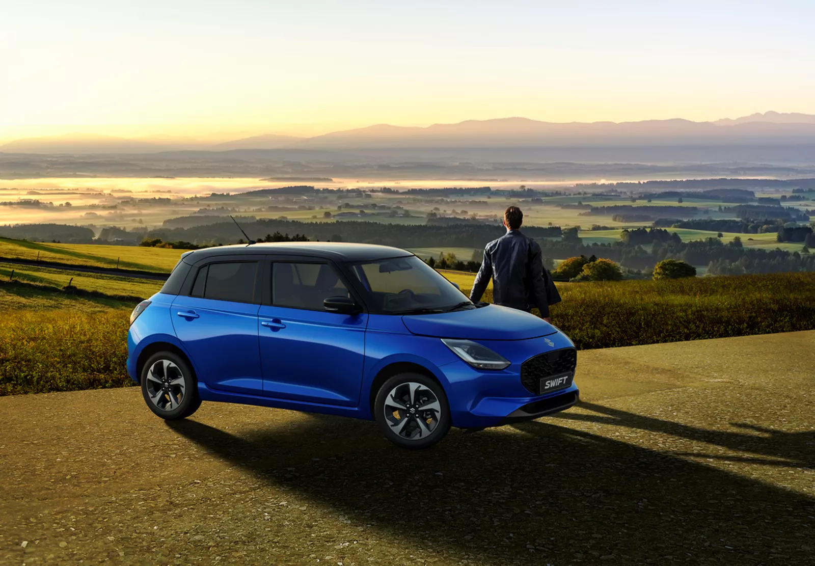 Suzuki Swift up a hill