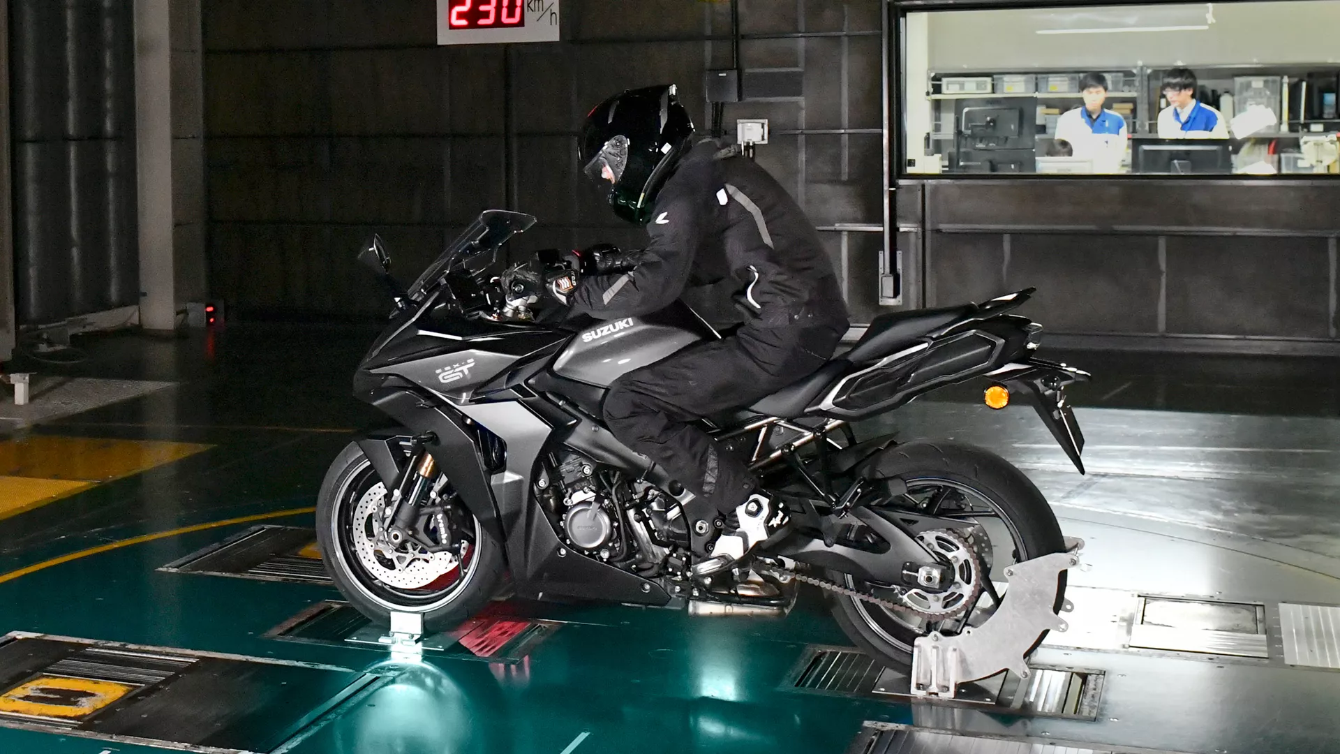 Suzuki GSX-S1000GT+ action side-on in a wind tunnel.