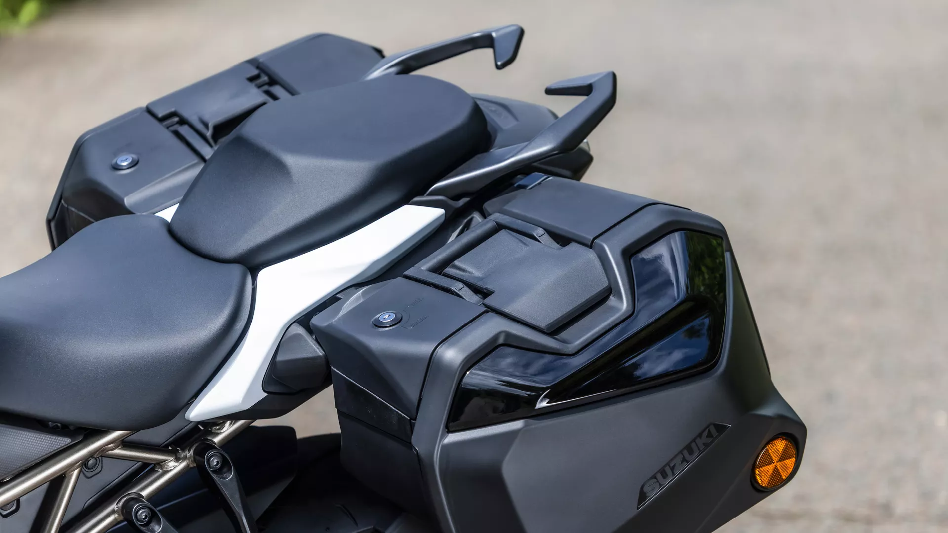 Suzuki GSX-S1000GT+ rear three quarters showcasing the hard luggage