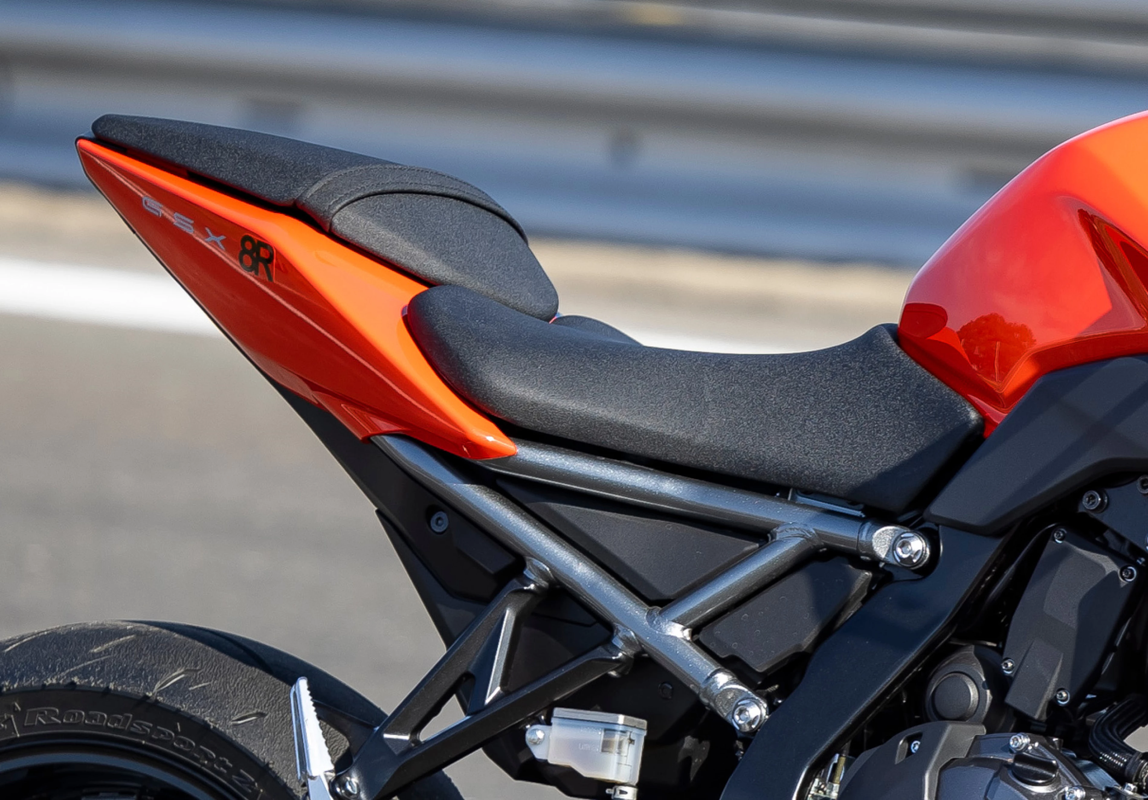 Suzuki GSX-8R close up of the seat and rear pillion seat from the right hand side in a pitlane