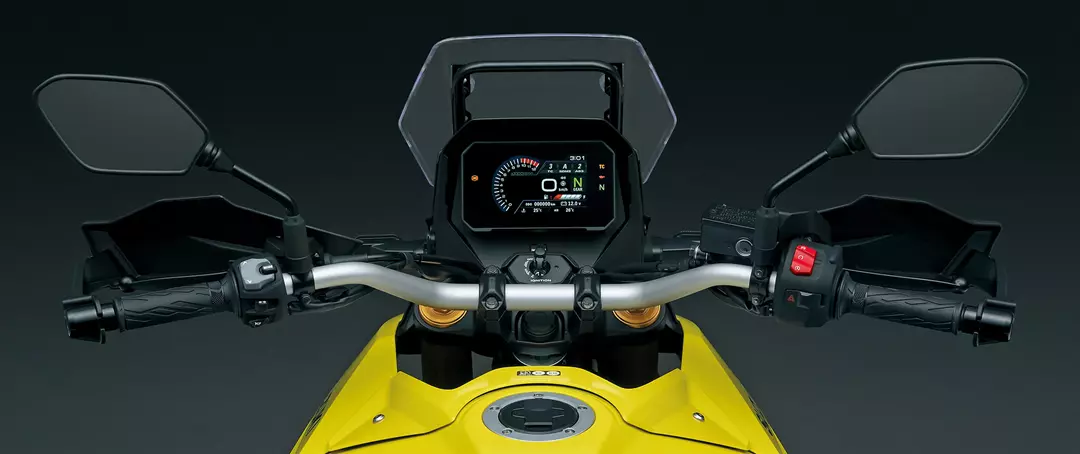 Close-up of the Suzuki V-Strom 800DE's fuel tank and handlebars