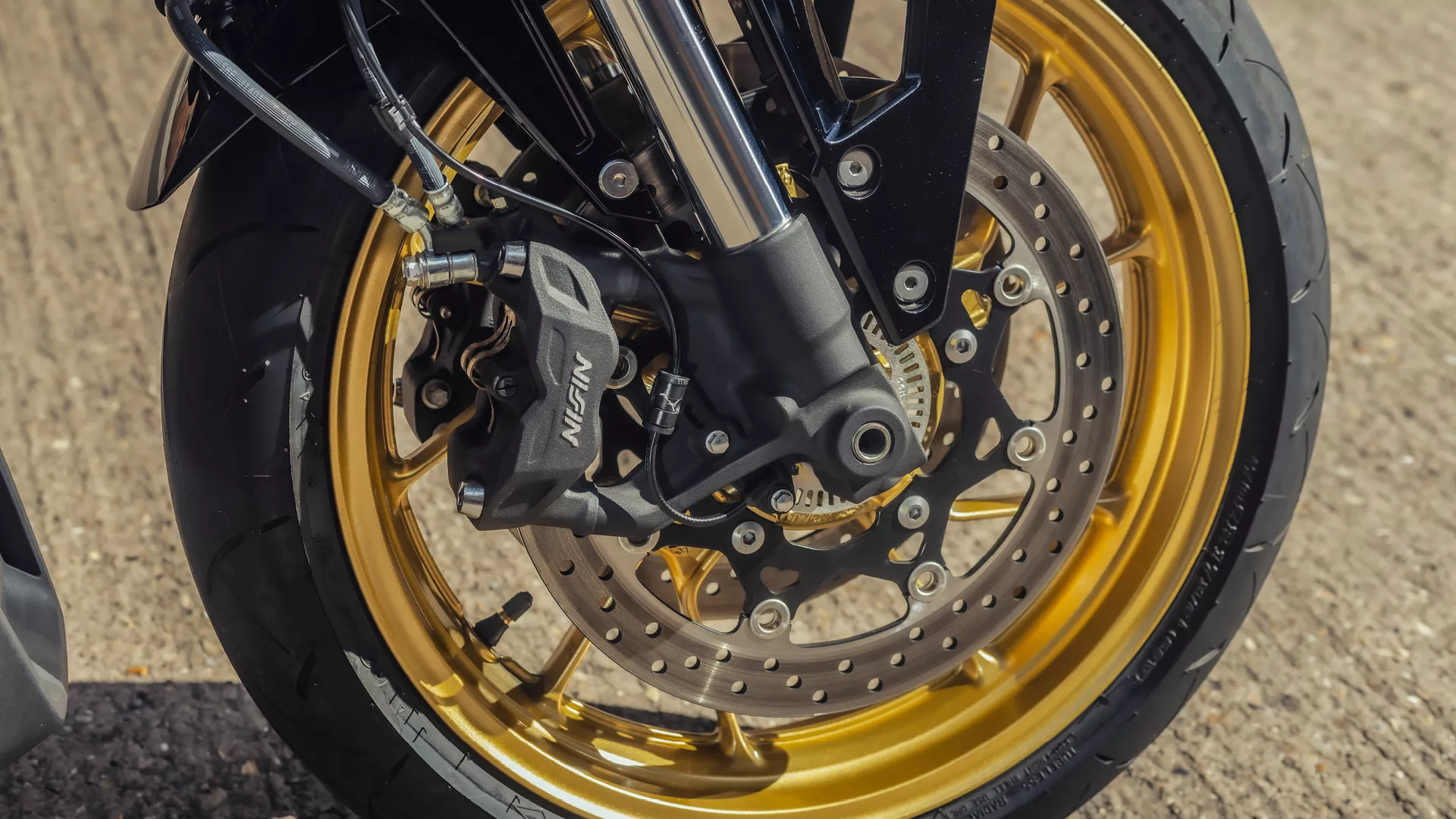 Suzuki GSX-8TT front wheel and brakes close up.
