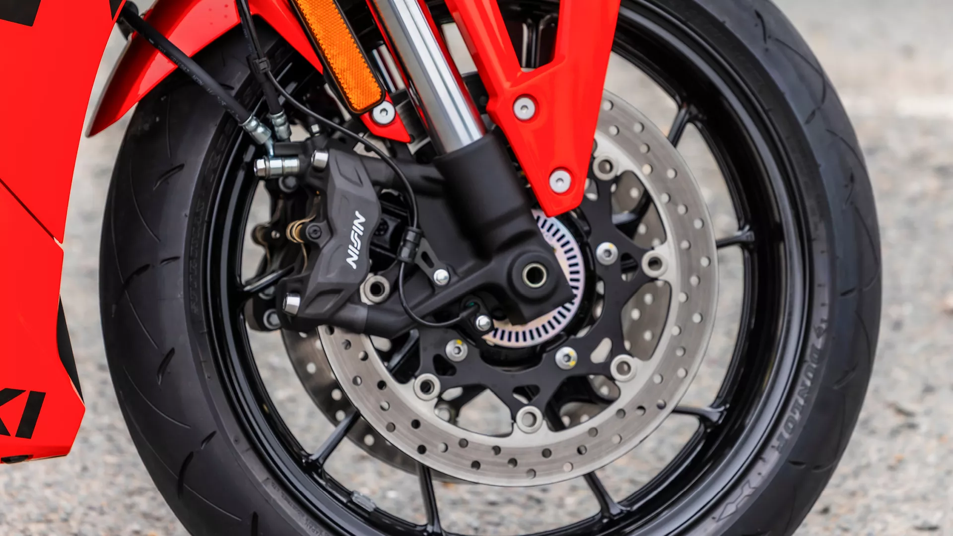 Suzuki GSX-8R front brake and tyre close up on location