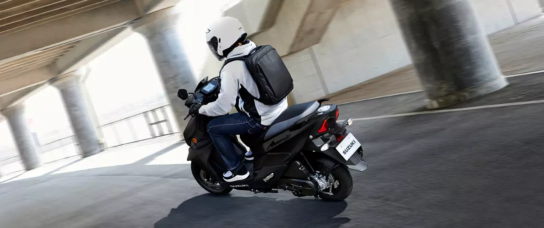 Suzuki Avenis 125 rear shot going through a city tunnel.