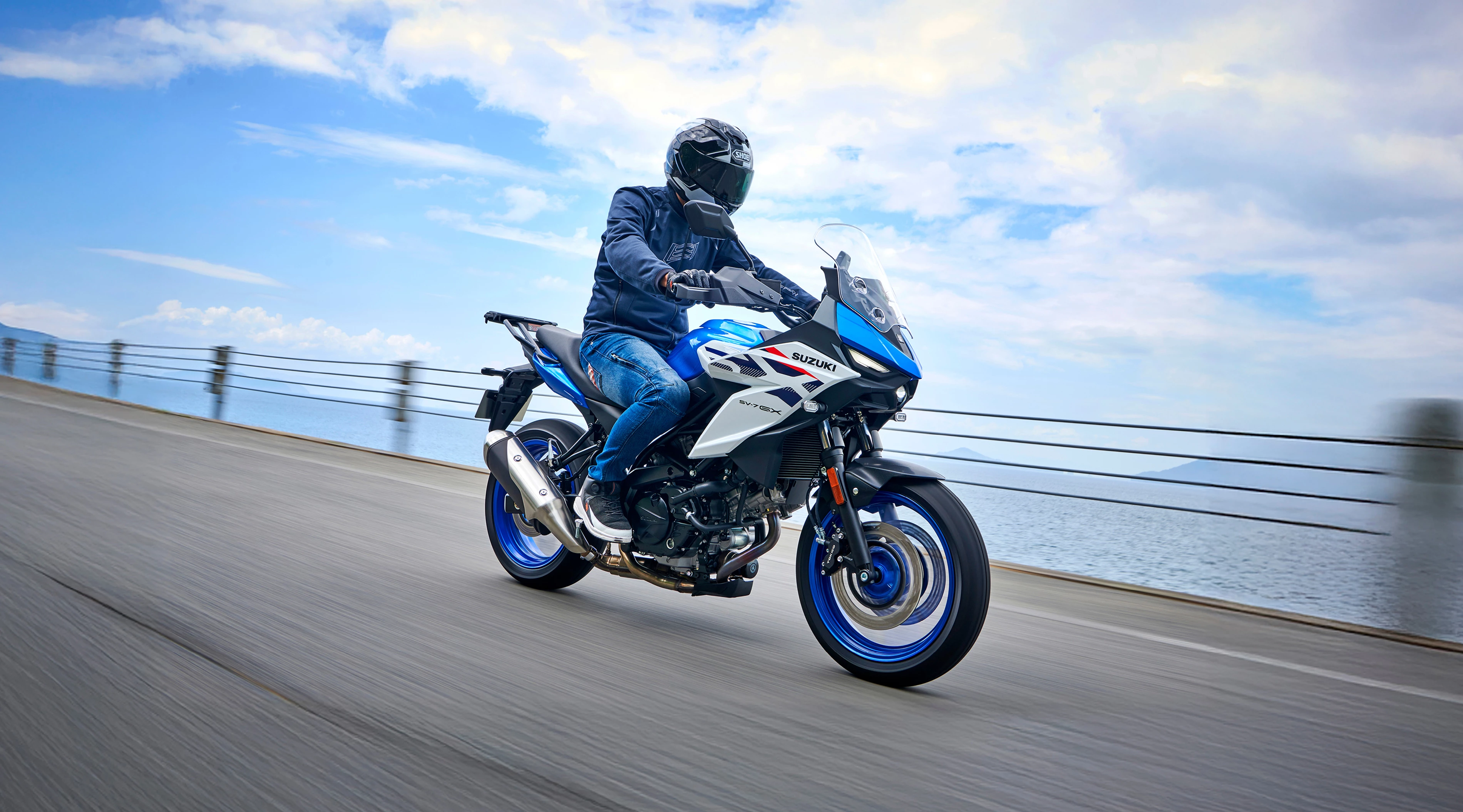 Suzuki SV-7GX passing over a bridge