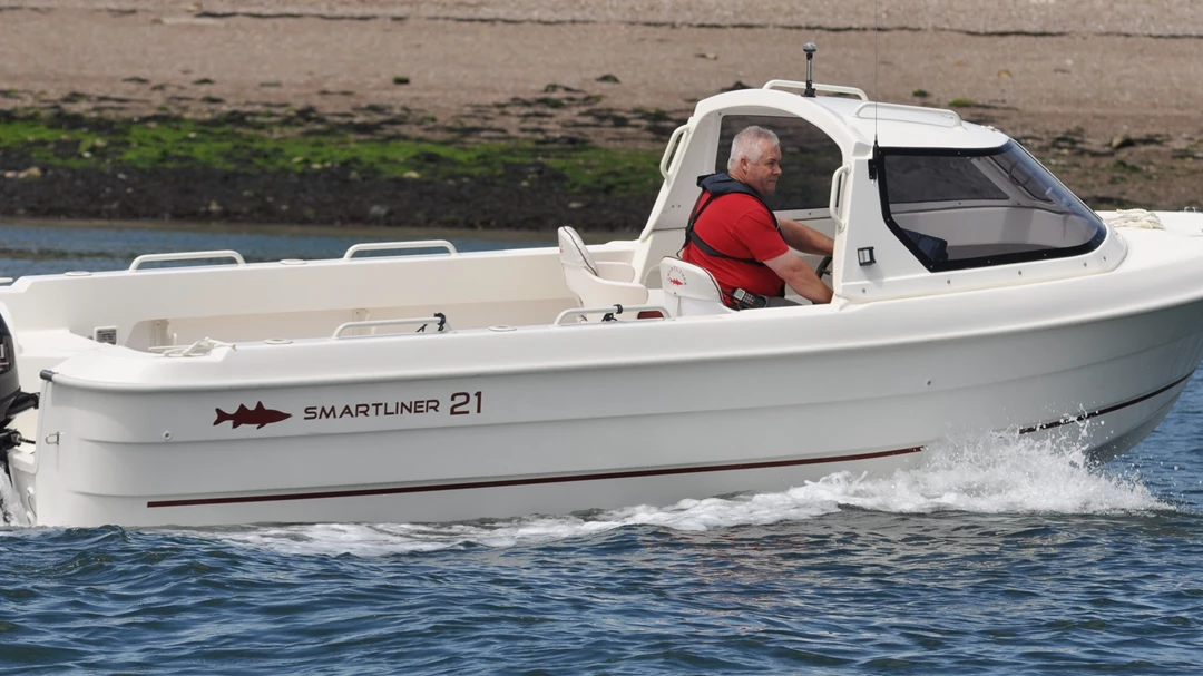 Person driving Smartliner boat
