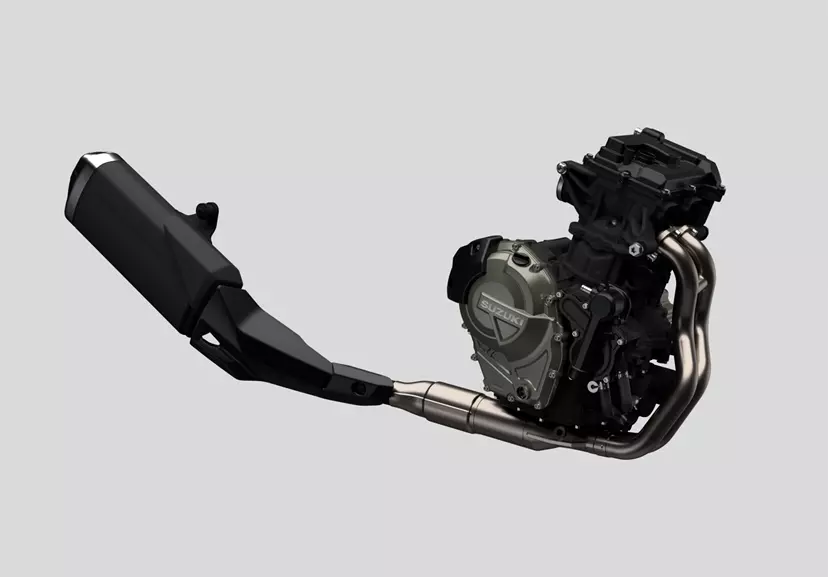 The Suzuki V-Strom 800DE engine with an exhaust system, showcasing its advanced engineering and design.