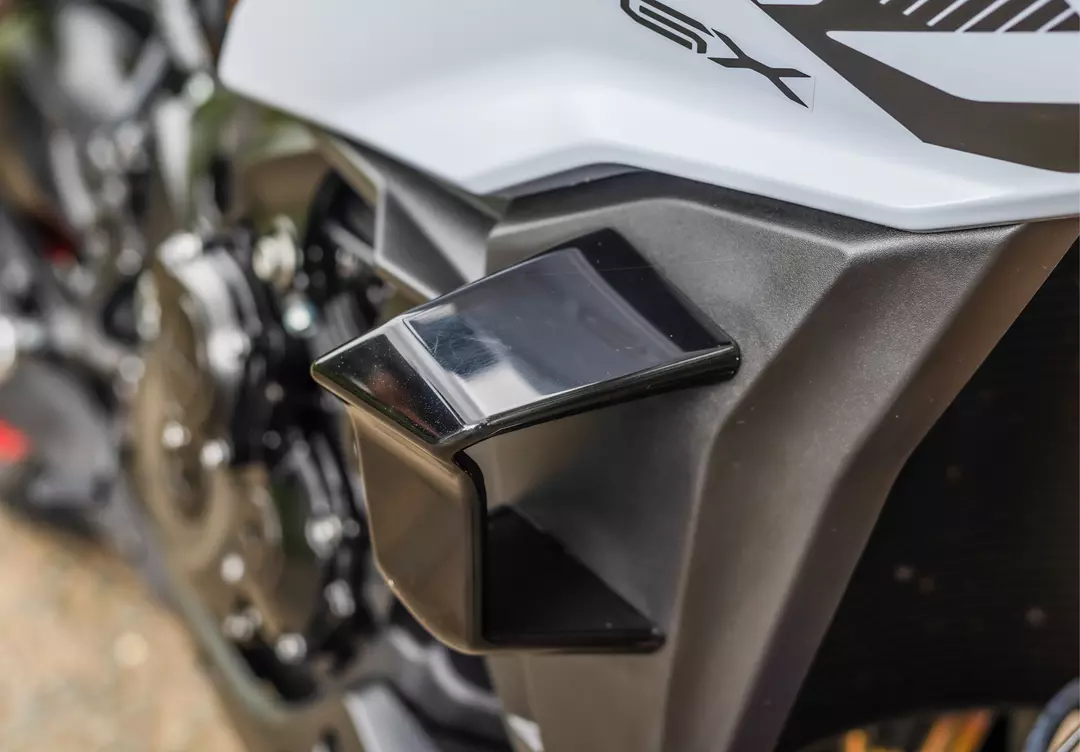 Suzuki GSX-S1000GX+ winglet close up from in front of the front fairing