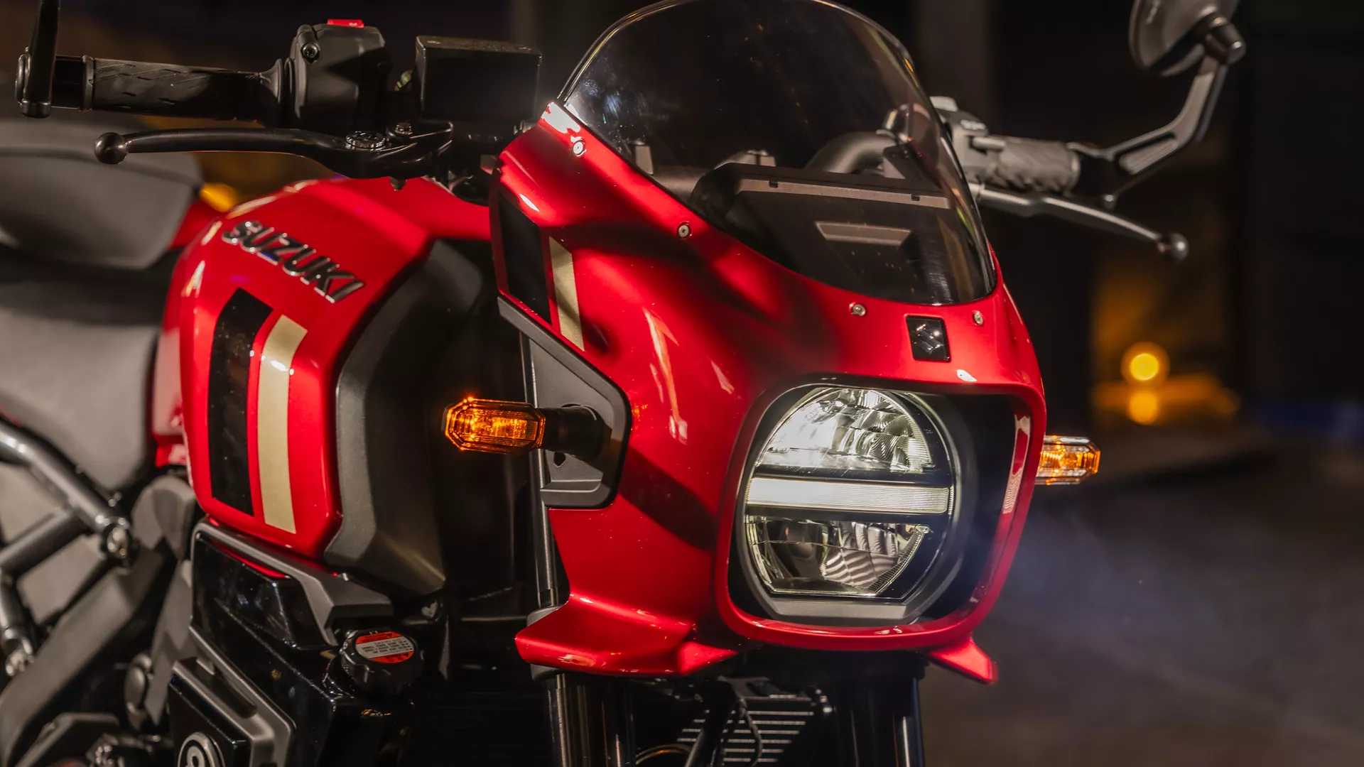 Suzuki GSX-8TT red close up of the front cowl and headlight
