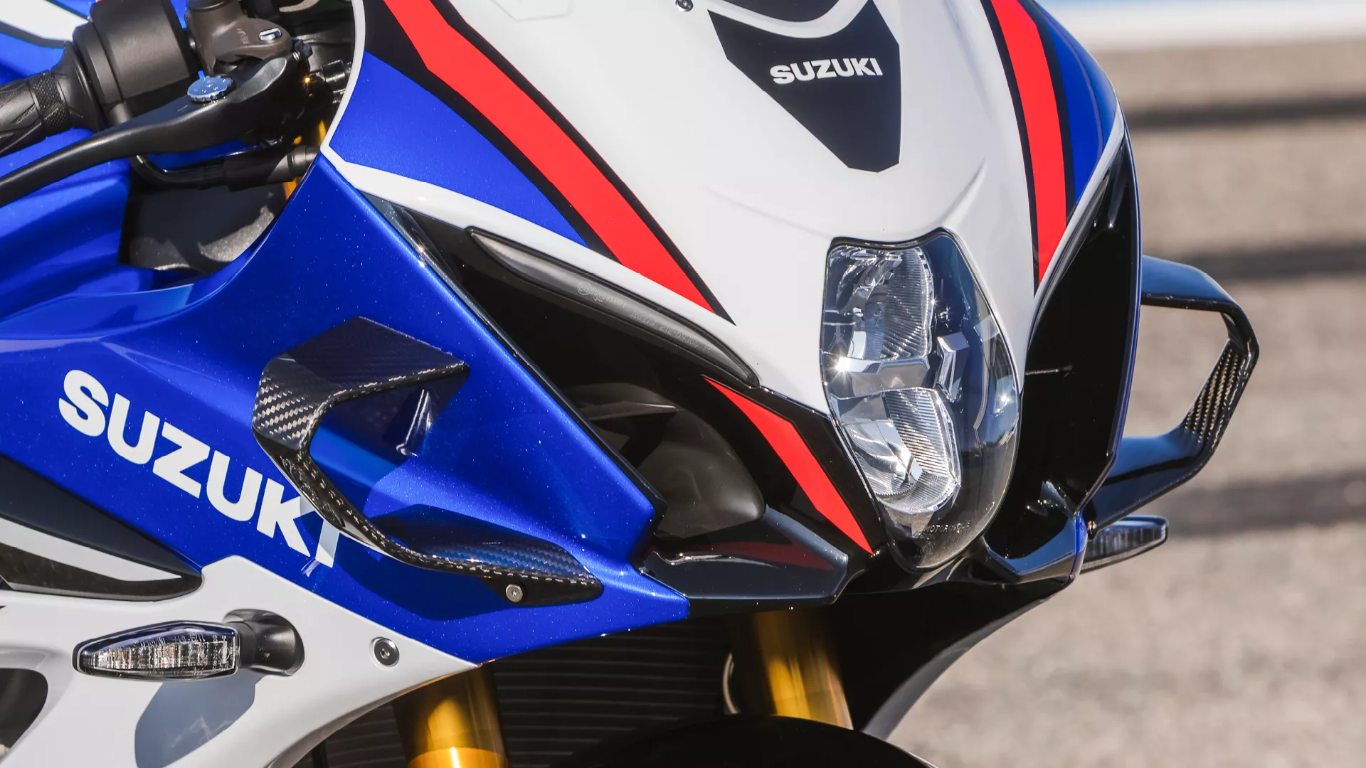 Suzuki GSX-R1000R blue, front end and right had side close up of wings, headlight and fairing