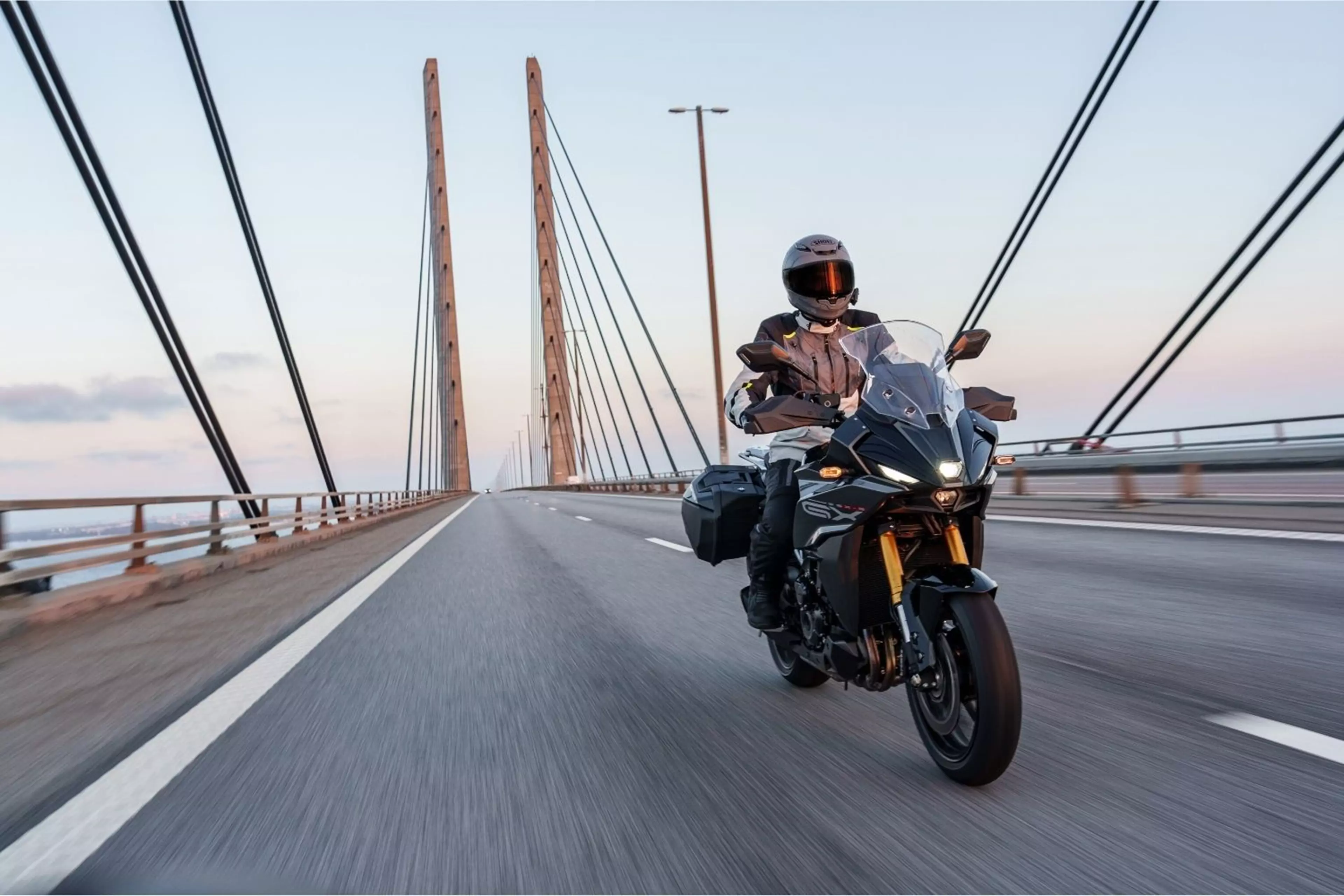 Suzuki GSX-S1000GX black riding across the Oresund Bridge