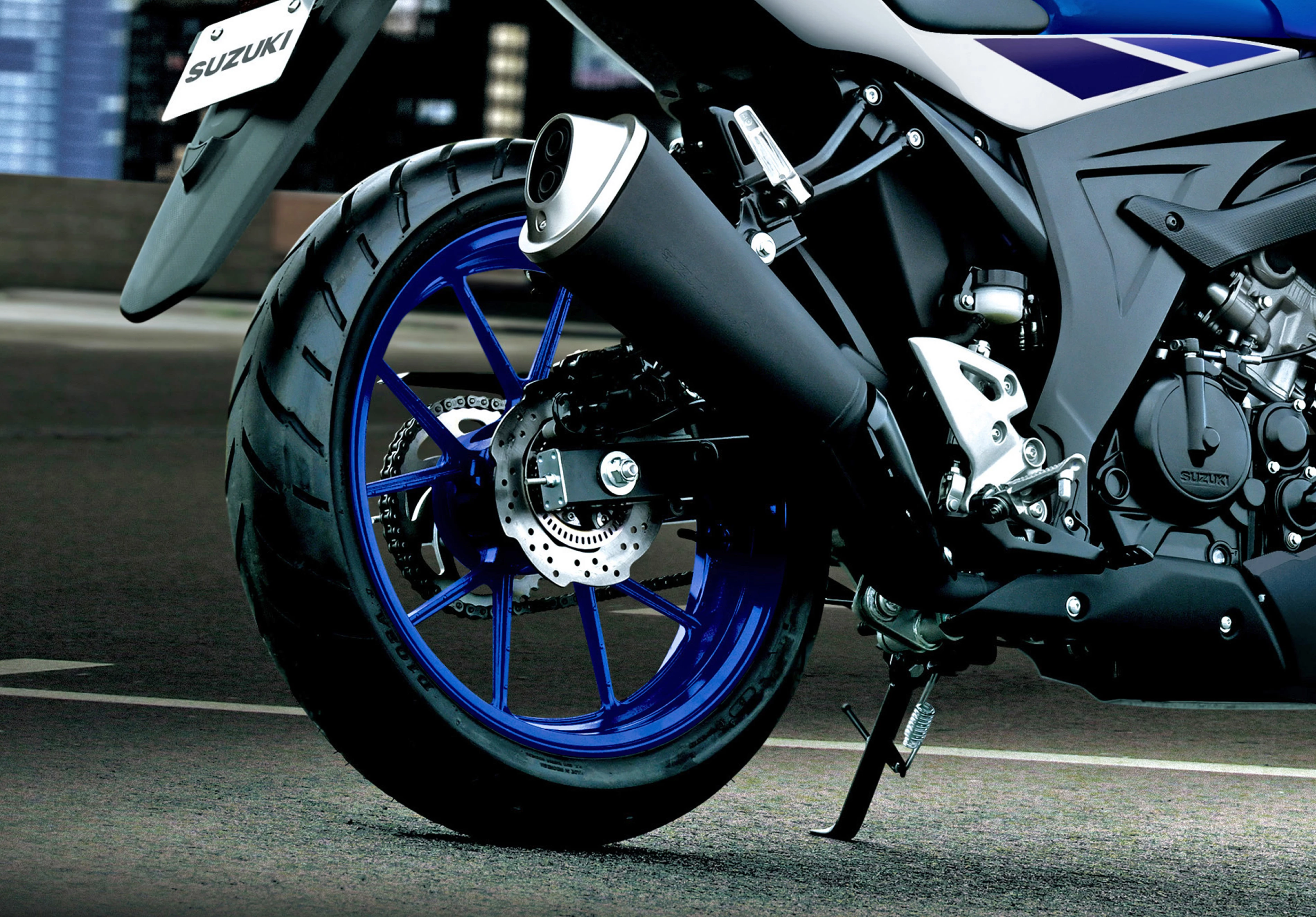 Suzuki GSX-S125 rear wheel and exhaust close up