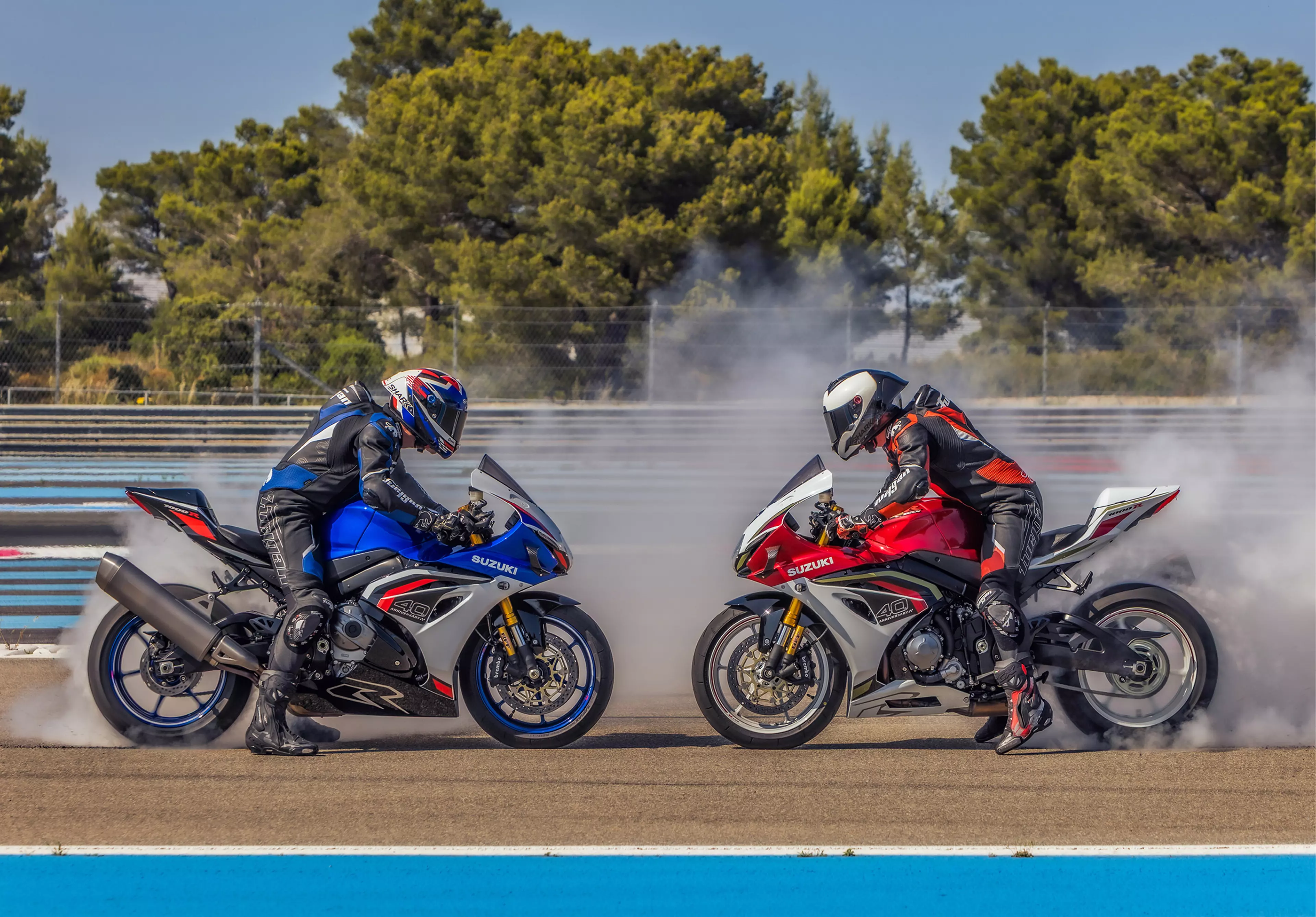 Suzuki GSX-R1000R two bikes head to head doing burnouts