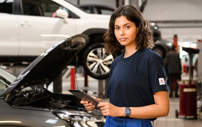 Suzuki Employee at Laptop