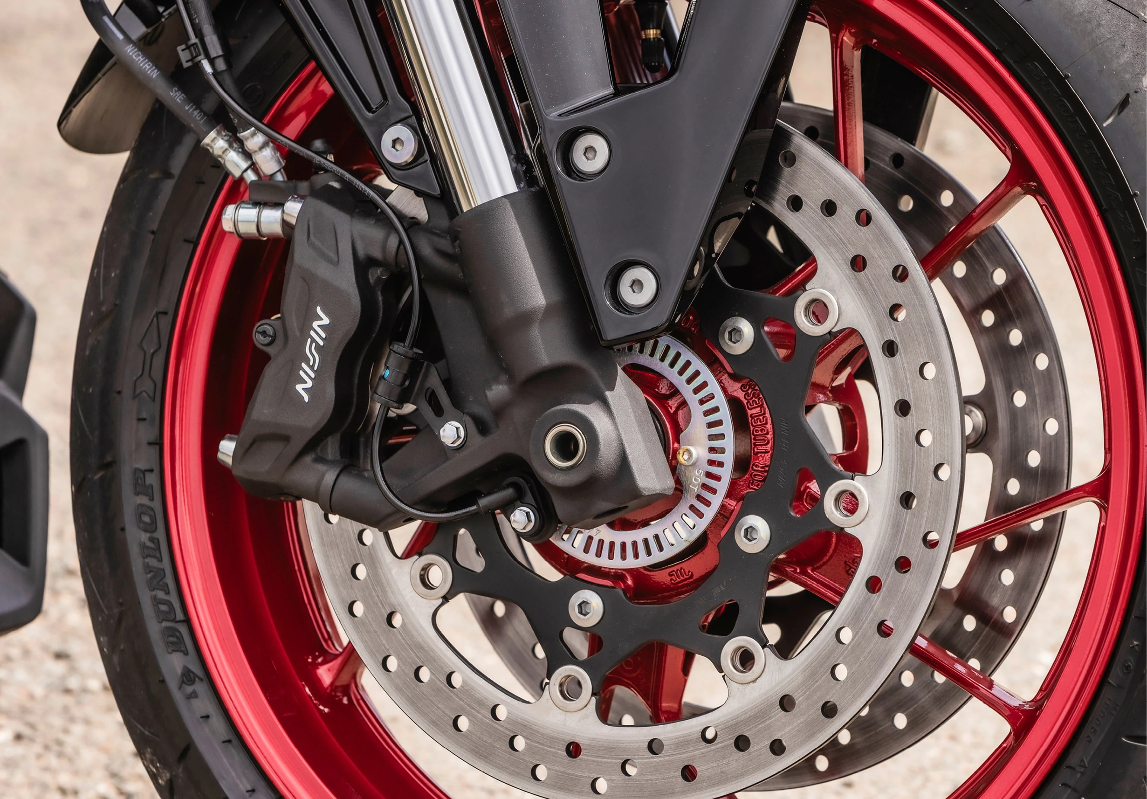 Suzuki GSX-8TT front wheel and brakes close up.