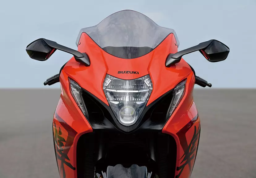 Close-up of the Suzuki 25th anniversary Hayabusa’s front fairing and LED headlights, showcasing its aggressive, aerodynamic design.
