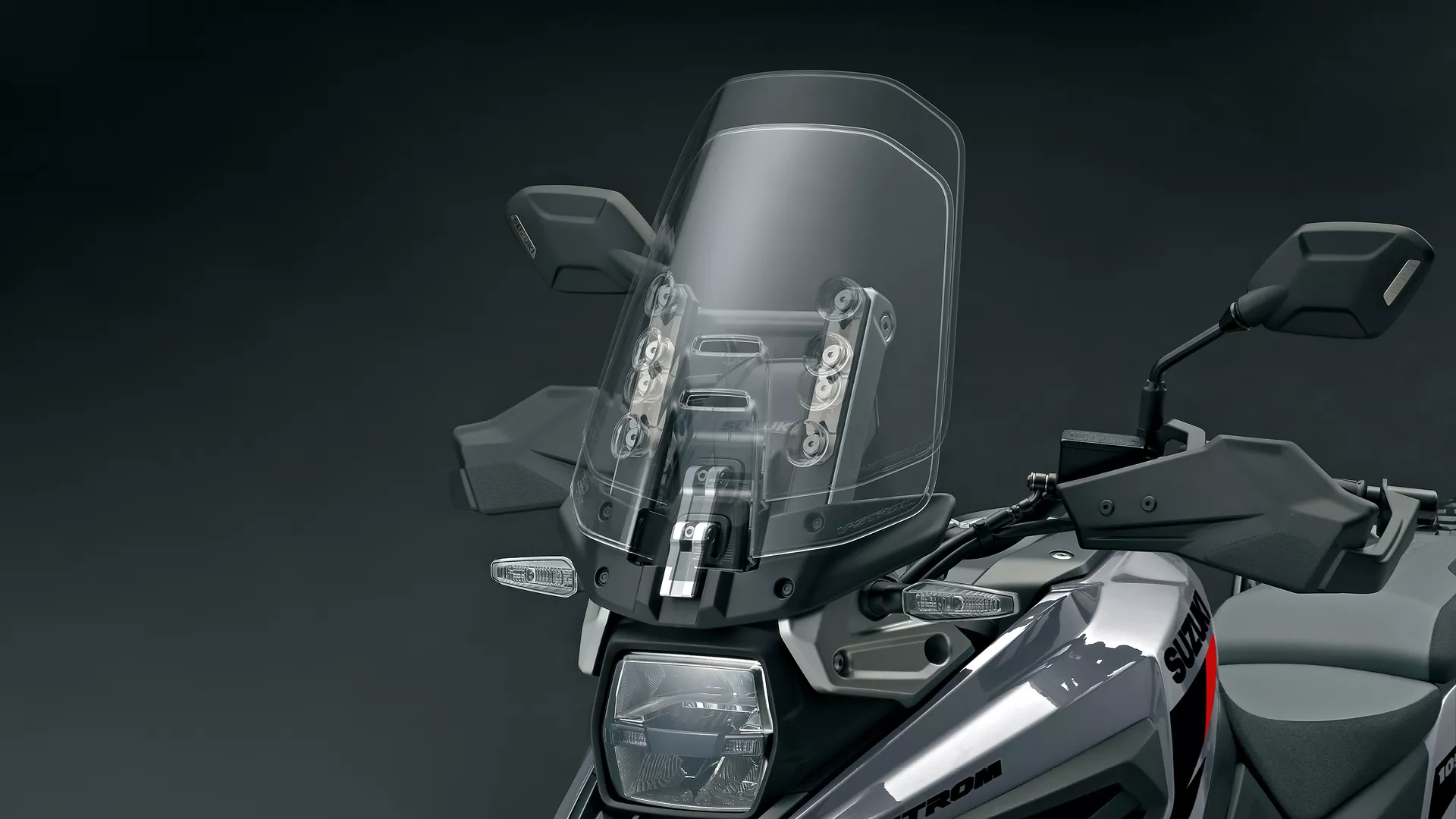 Suzuki V-Strom 1050RE grey, CAD of the front screen demonstrating the different height settings.