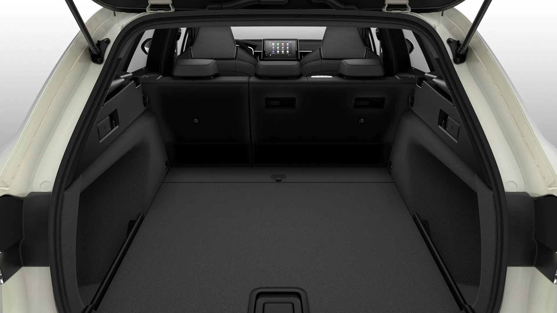 View of Suzuki Swace boot space showing 596-litre luggage capacity with rear seats folded, highlighting spacious interior for passengers and cargo.