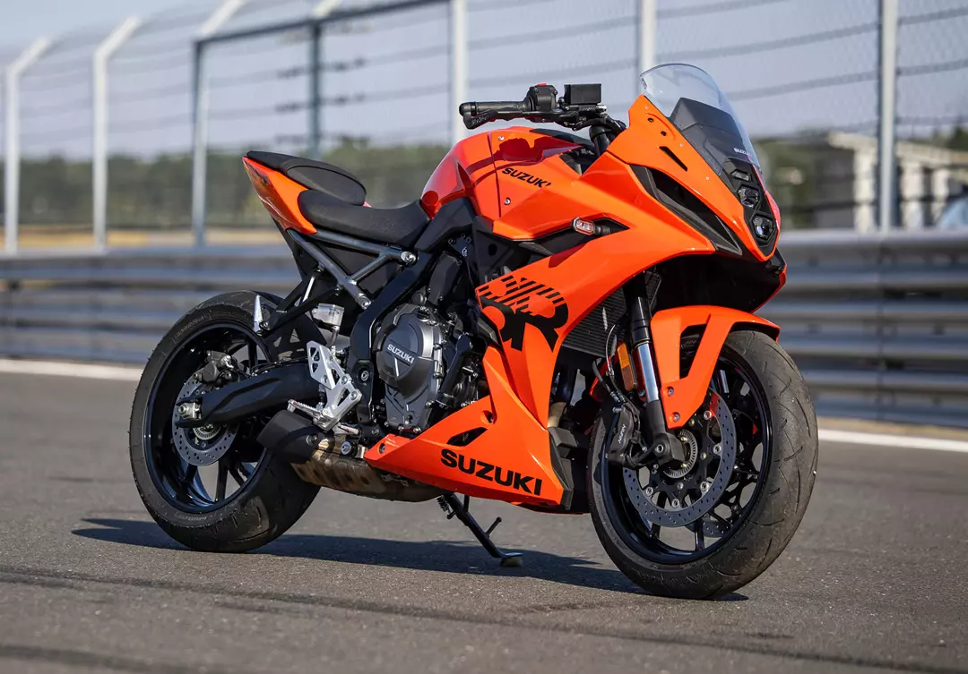 Suzuki GSX-8R side on front three quarters in a pit lane. 