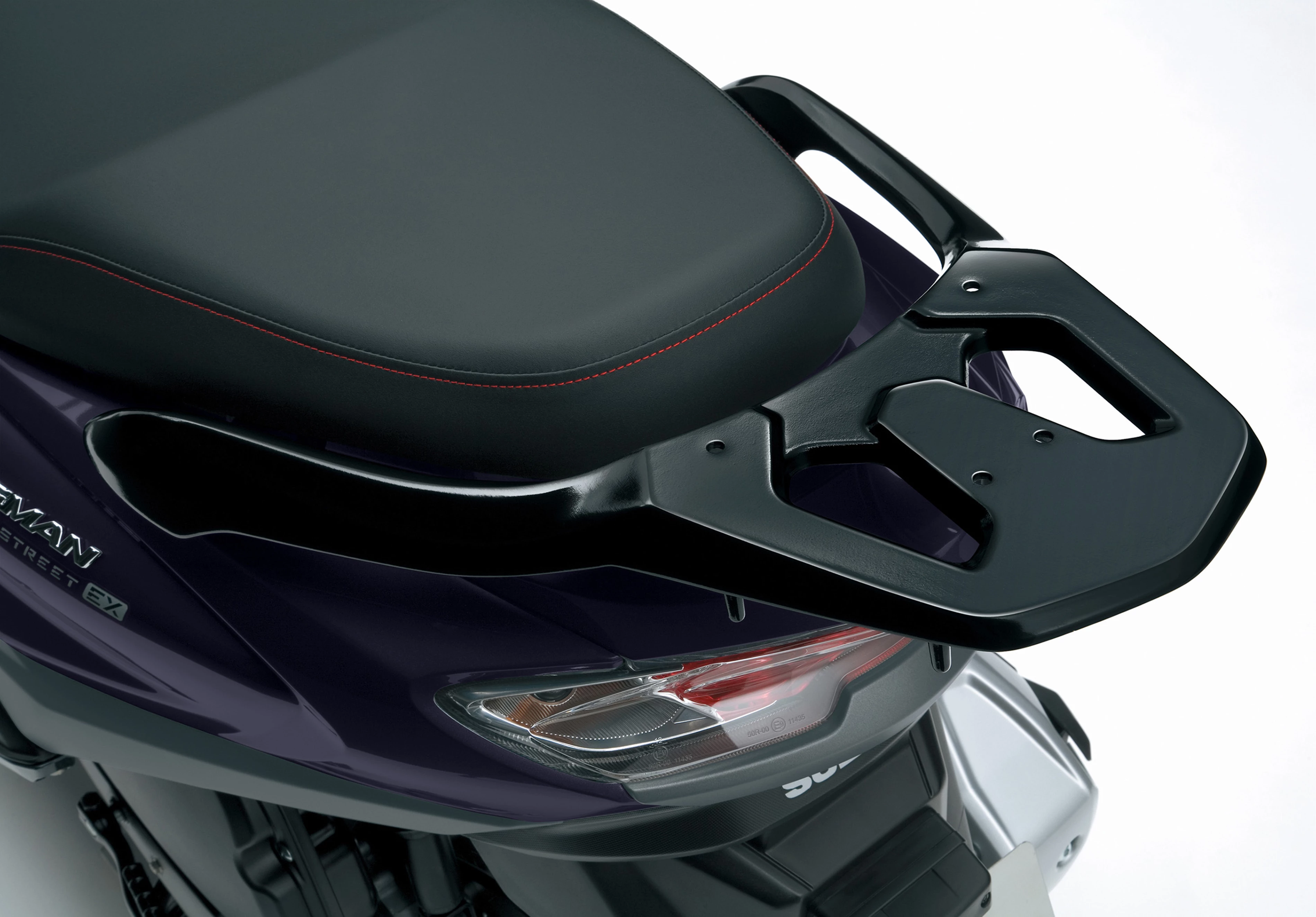 Suzuki Burgman Street 125EX close-up of the rear lighting system, featuring a sleek LED taillight and sturdy grab rail.