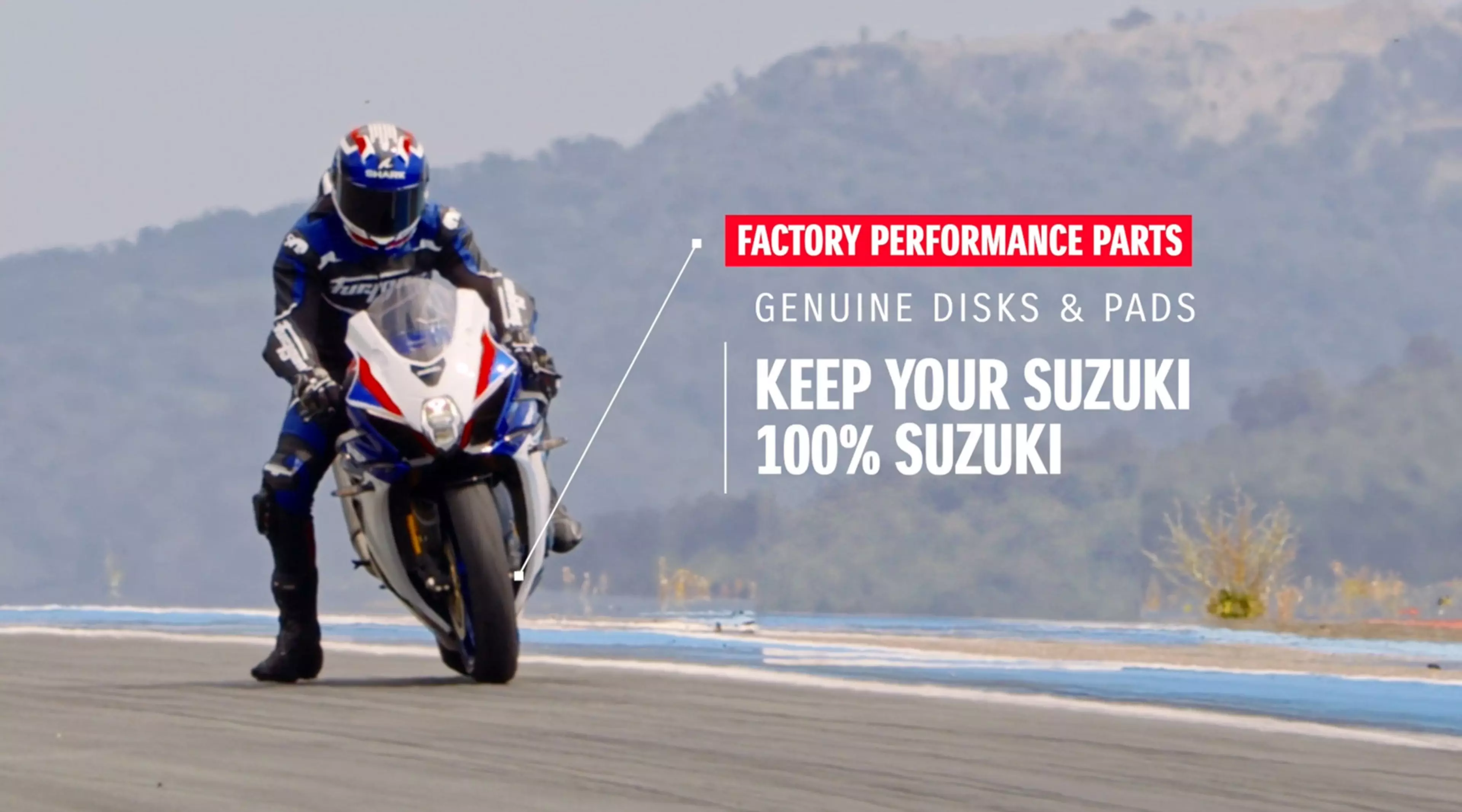 Suzuki GSX-R1000R braking hard into a corner.