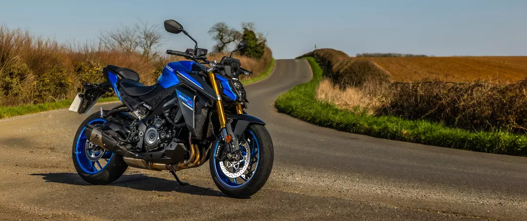 Suzuki GSX-S1000 right hand side on image with a countryside background. 