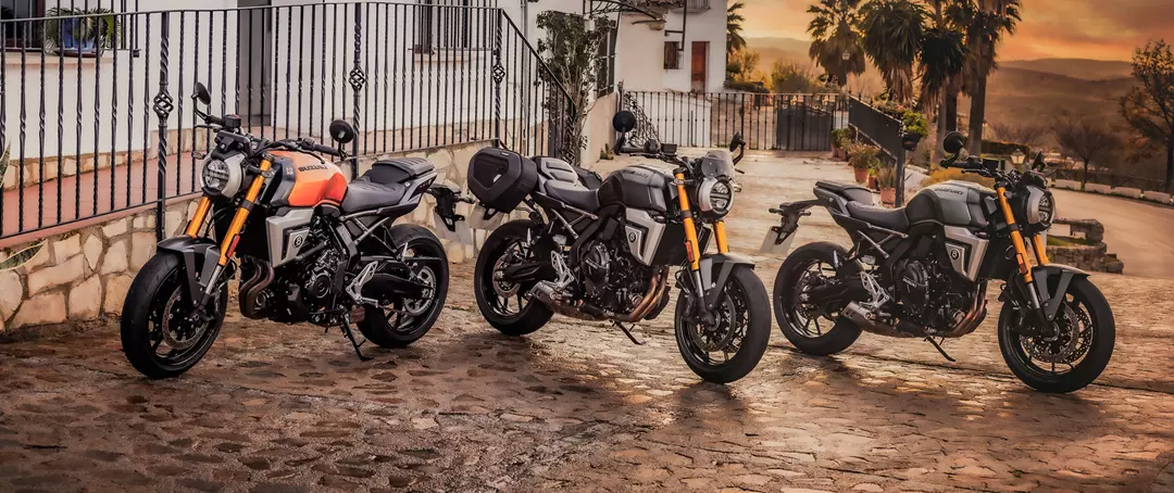 Suzuki GSX-8T three colour static at sunset outside a cafe