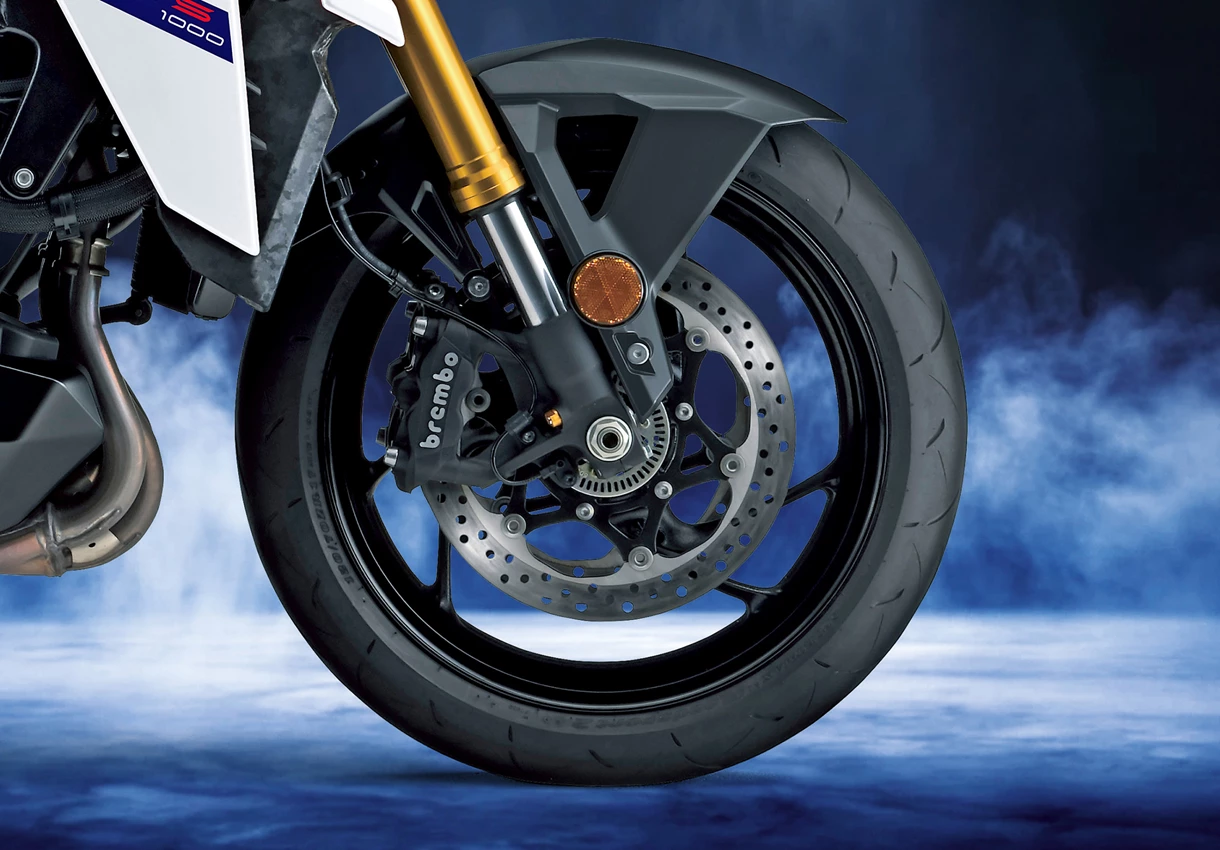 Suzuki GSX-S1000 Brembo brakes with a studio blue background