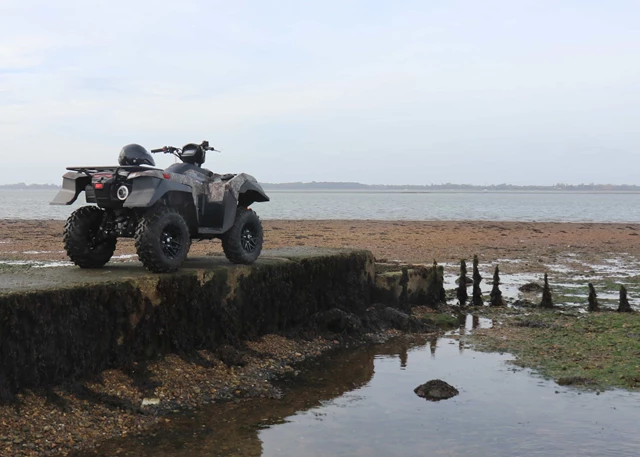 Suzuki ATV KingQuad on beach