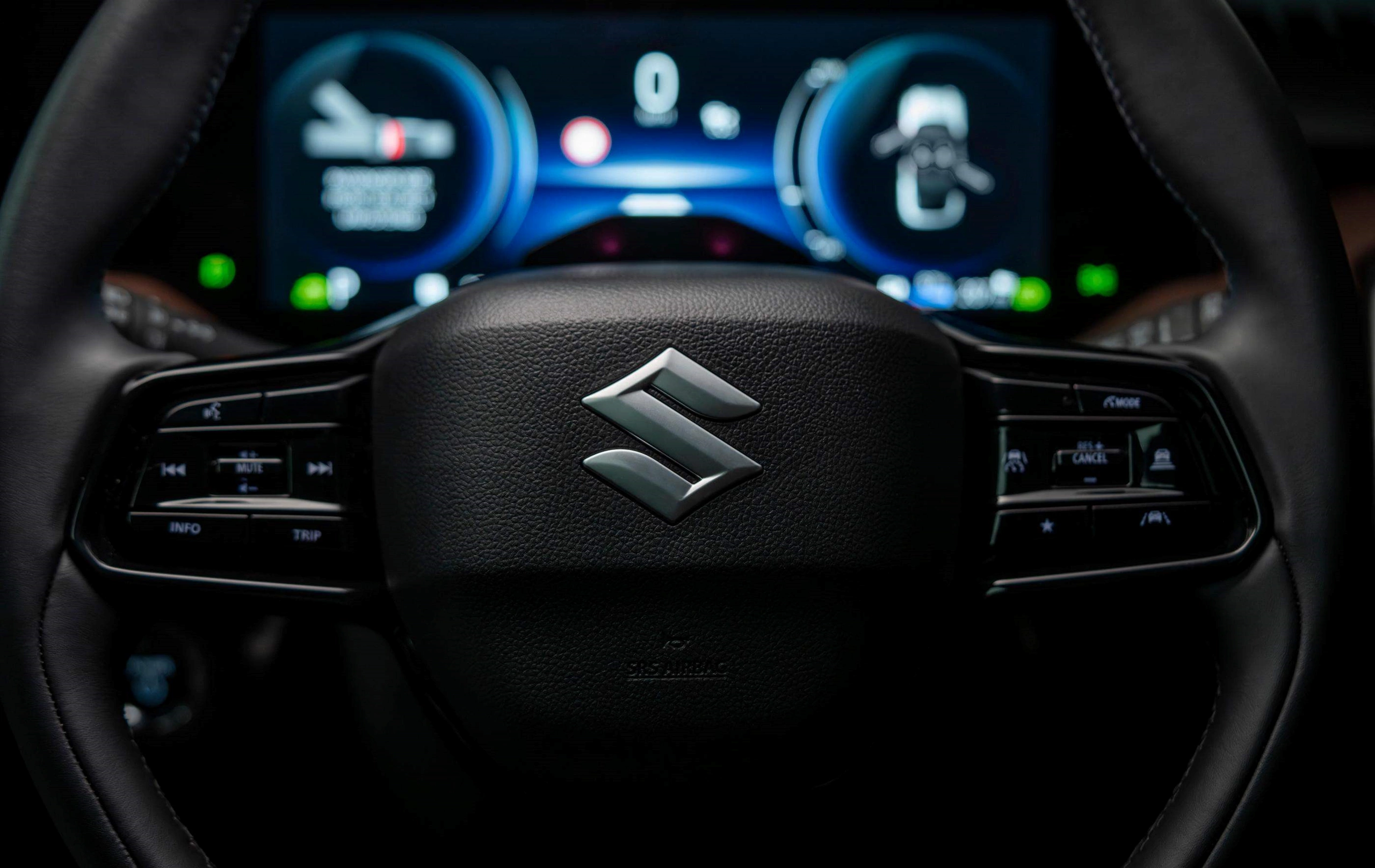 Close-up of Suzuki car interior steering wheel