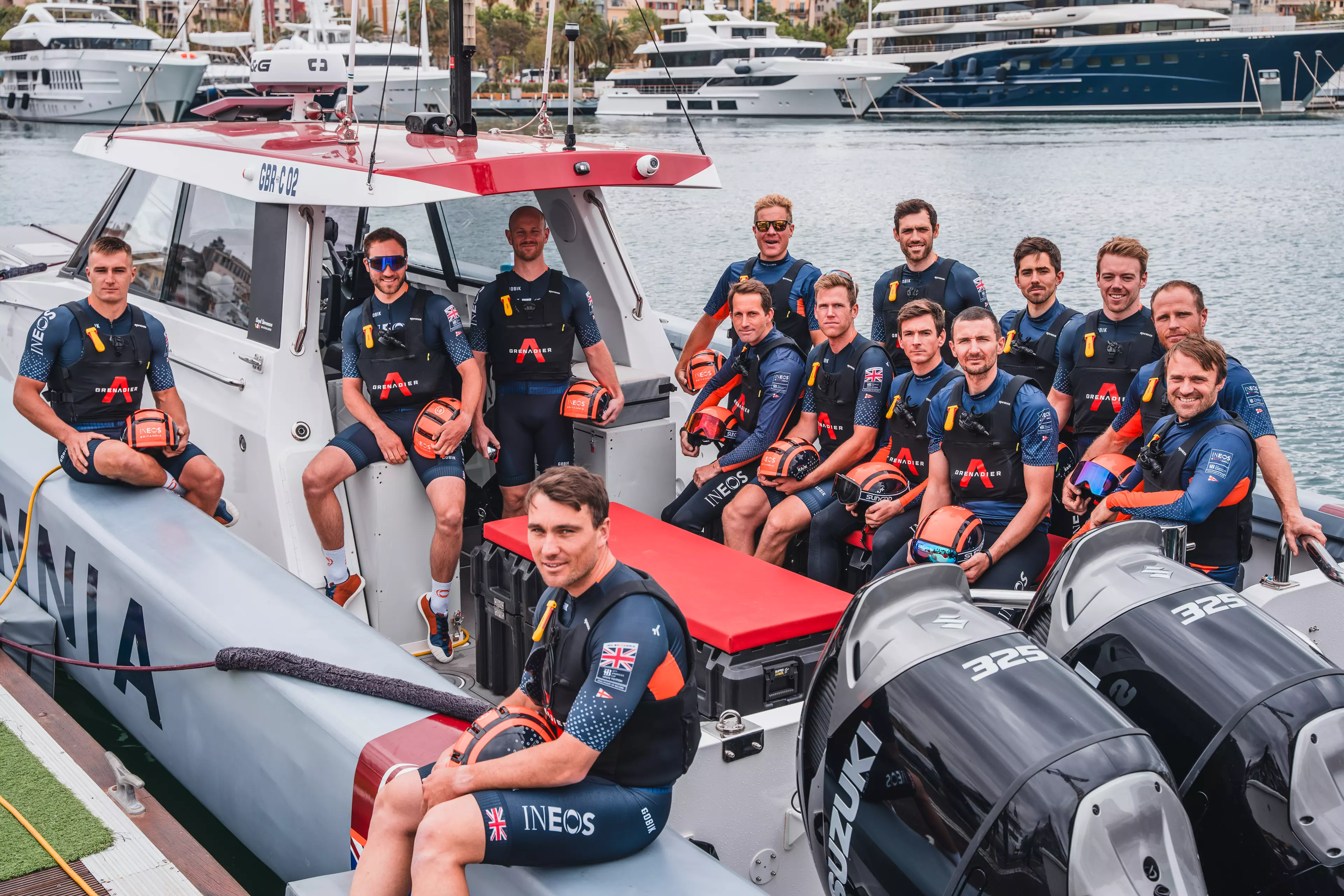 The INEOS Britannia team sat on their chase boat powered by 4 Suzuki outboards