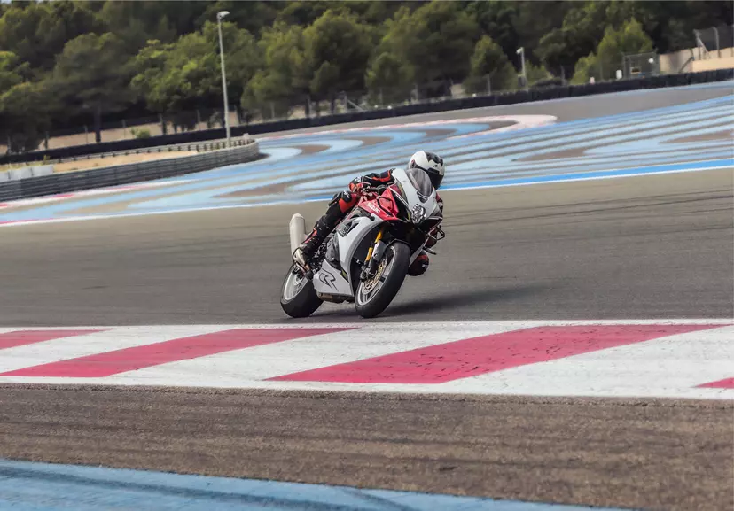 Suzuki GSX-R1000R pushing out of a corner on track