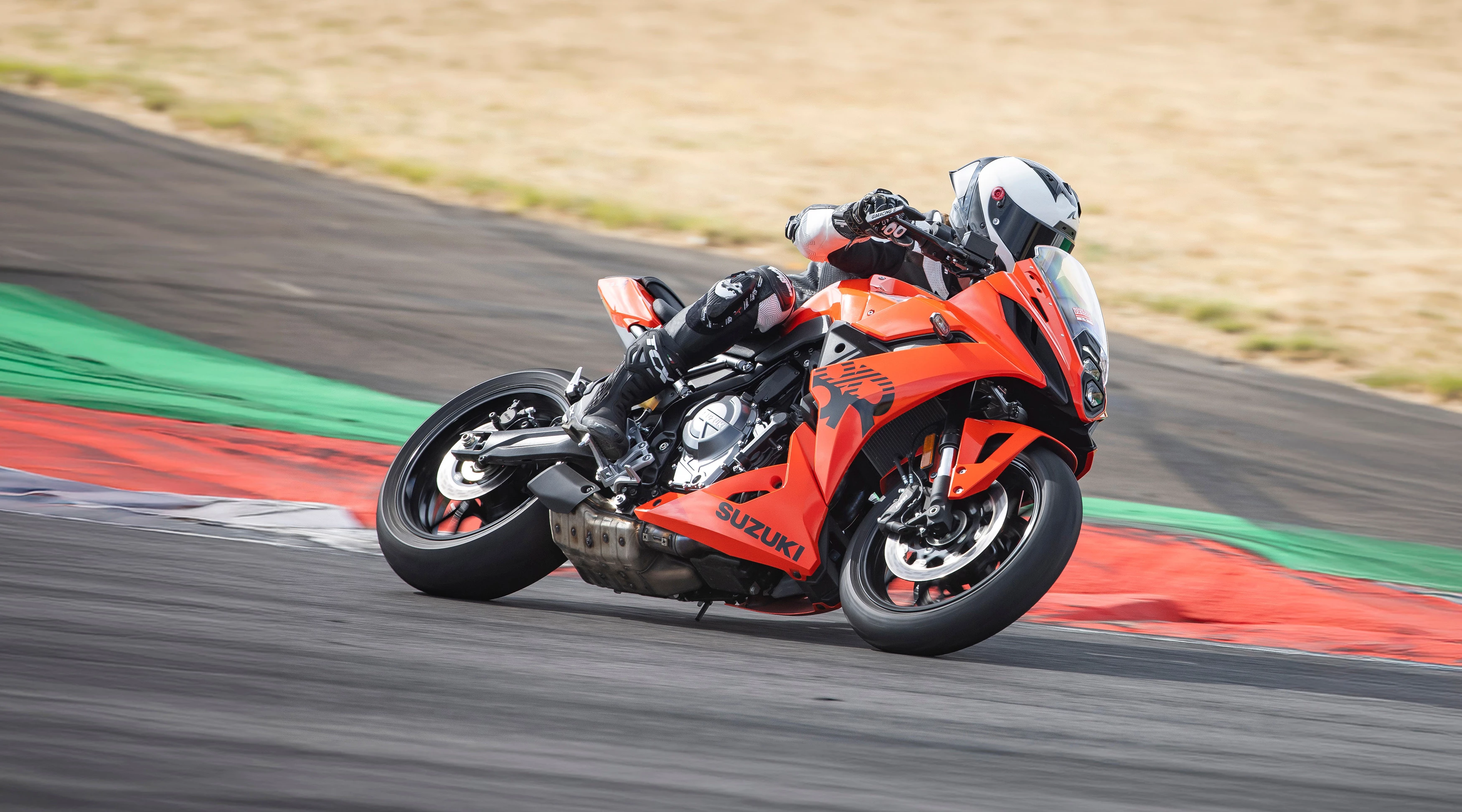 Suzuki GSX-8R leaning into a corner on track