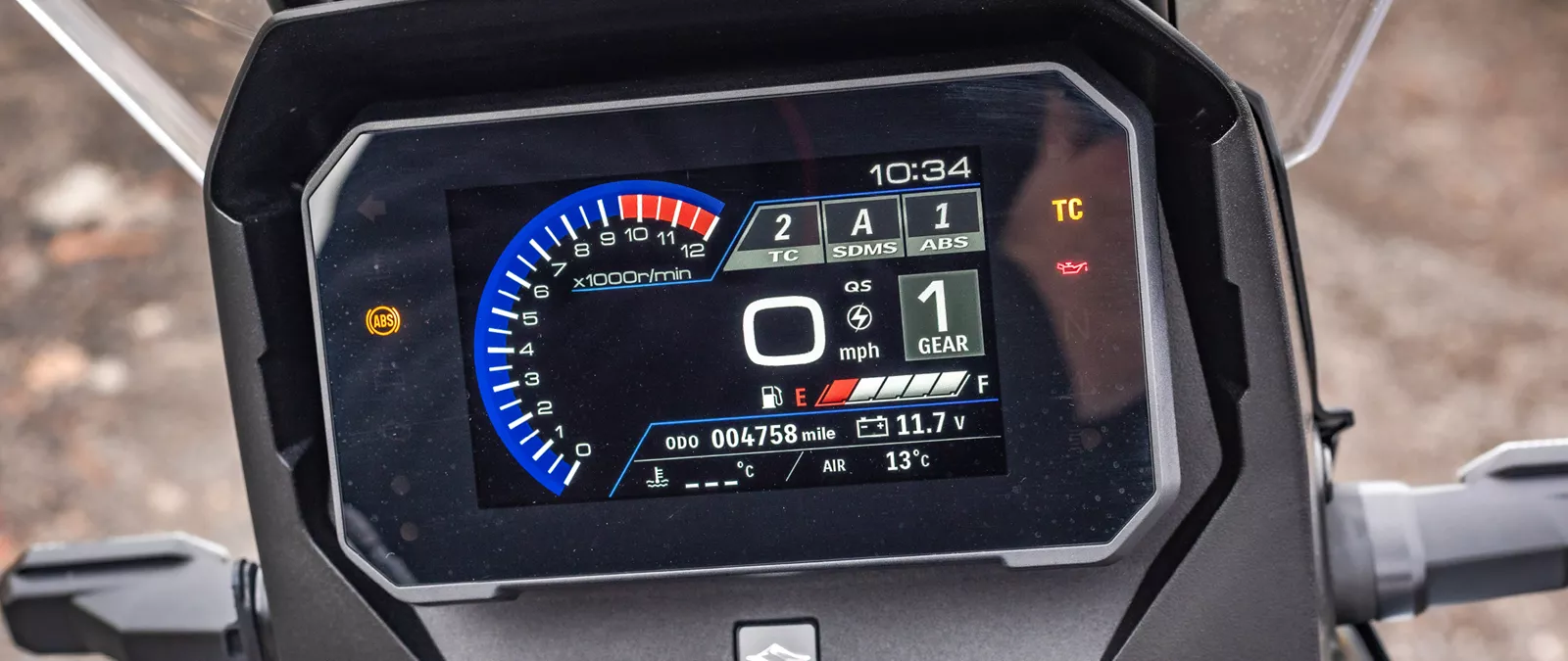 Suzuki V-Strom 800DE TFT dash close up on location