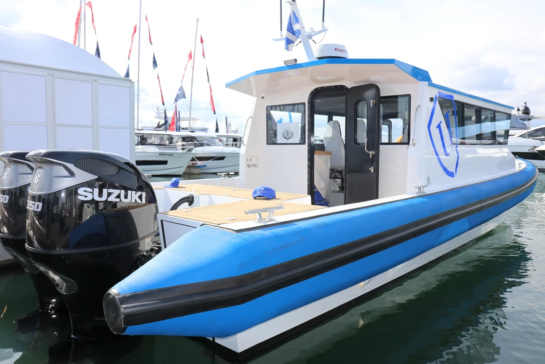  Boat in harbour with 2 Suzuki outboards
