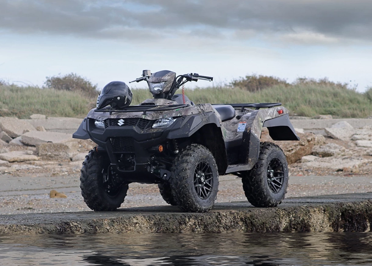 KingQuad ATV on slipway next to water