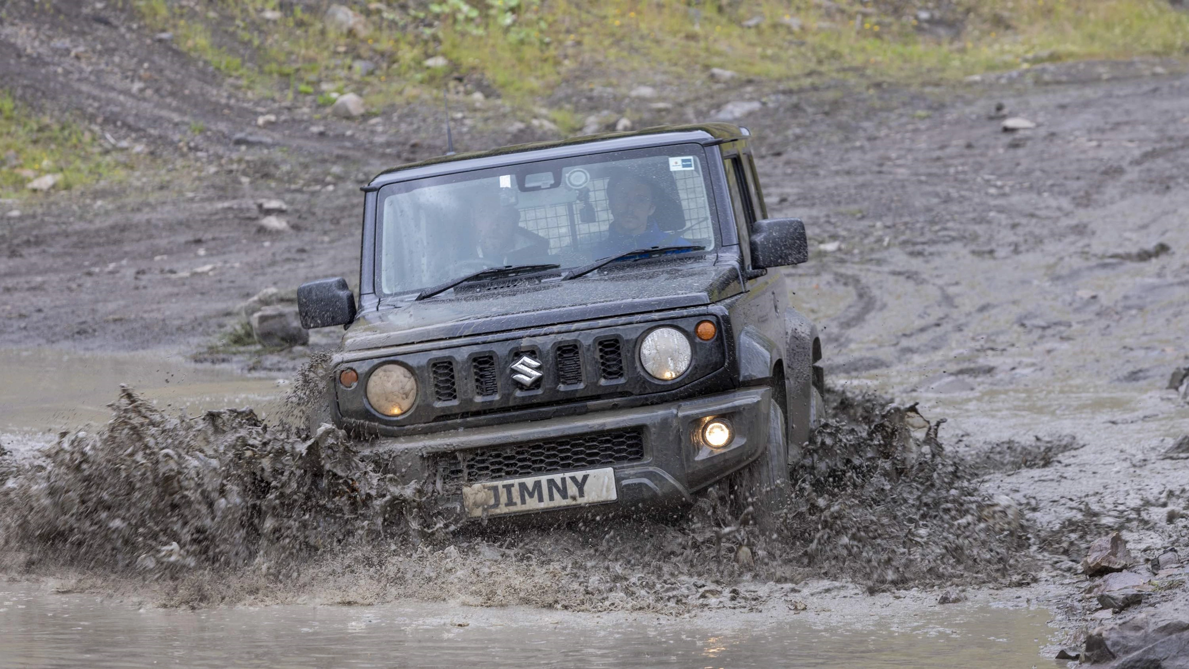 Suzuki Jimny LCV wading through mud