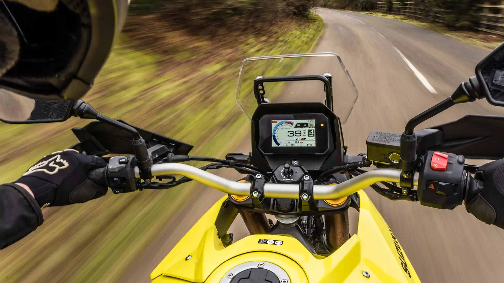 Suzuki V-Strom 800DE from the rider's POV looking at the bars and dash whilst on the road