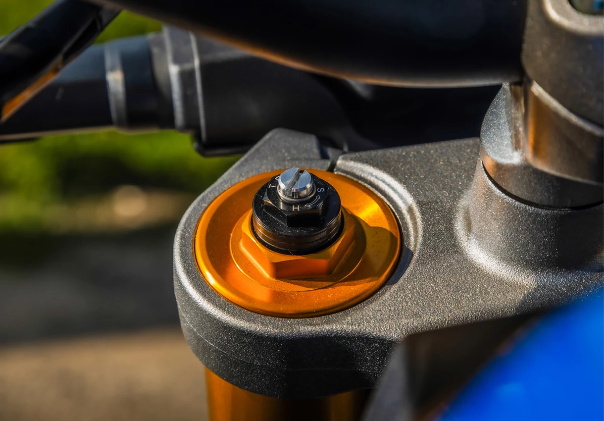 Suzuki GSX-S1000 KYB suspension top yoke close up on location. 